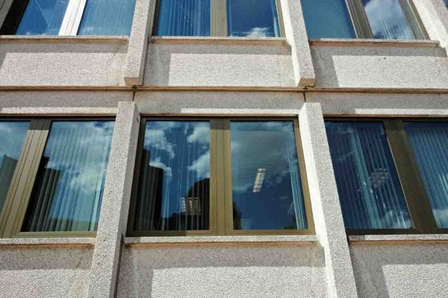 Bottom view of a building with multiple windows