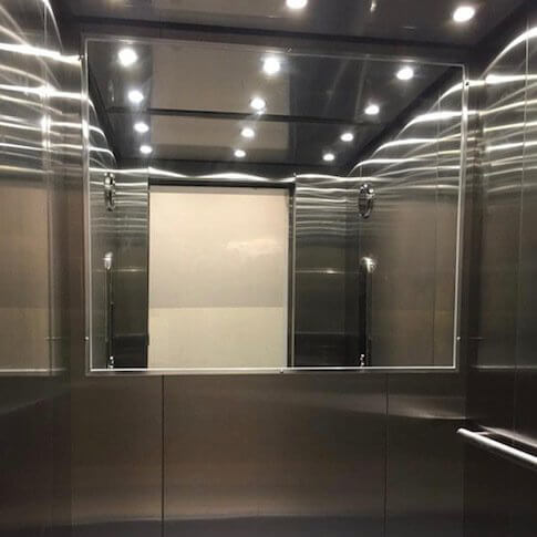 Mirror installed in the elevator